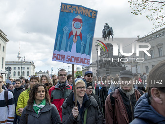 Paople attending the 'March for Science' hold a banners in support to science and research in Berlin, Germany on April 22, 2017. Thousands o...