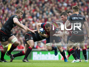 Tommy O'Donnell of Munster tackled by Jamie George of Saracens during the European Rugby Champions Cup Semi-Final match between Munster Rugb...