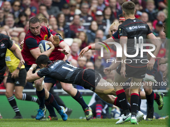 Tommy O'Donnell of Munster tackled by Sean Maitland of Saracens during the European Rugby Champions Cup Semi-Final match between Munster Rug...