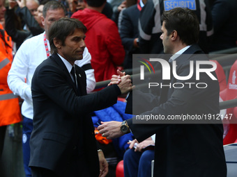 L-R Chelsea manager Antonio Conte  and Tottenham Hotspur manager Mauricio Pochettino during The Emirates FA Cup - Semi-Final match between C...