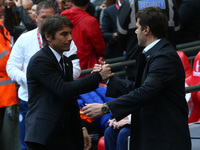 L-R Chelsea manager Antonio Conte  and Tottenham Hotspur manager Mauricio Pochettino during The Emirates FA Cup - Semi-Final match between C...