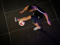 Participants are seen competing in the national freestyle football competition on 22 April, 2017 in the Focus Park shopping mall in Bydgoszc...