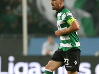 Sporting's Portuguese midfielder Adrien Silva in action during the Portuguese League football match Sporting CP vs SL Benfica at the Alvadad...