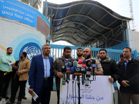 Palestinians protest before the UNRWA headquarters in Gaza to demand the UNRWA to take its responsibilities and provide the Palestinian refu...
