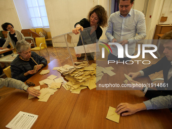 Volunteers count the ballots at the end of the first round of the French presidential election first round vote in Toulouse,  France on Apri...