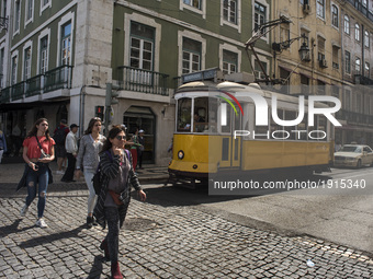 The old trams continue to travel through the historical center of the city of Lisbon (Portugal) mixing that classic with a modern one.
 (