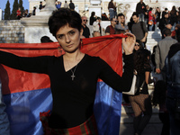 An Armenian woman with the Armenian flag takes part to a protest rally, at Syntagma square, in central Athens, on Monday April 24, 2017. Hun...