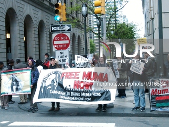 Supporters of Mumia Abu-Jamal rally outside the east entrance to the Criminal Justice Center in Philadelphia, PA on April 24, 2017. Mumia wa...