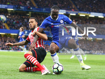 Southampton's Ryan Bertrand tackles Chelsea's Victor Moses 
during the Premier League match between Chelsea and Southampton at Stamford Brid...