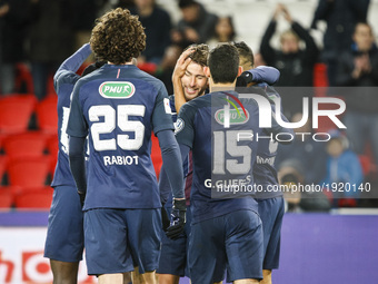 Paris Saint-Germain's Brazilian defender Maxwell (C) celebrates with teammates after scoring a goal during the French Cup semi-final match b...