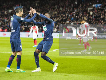 Paris Saint-Germain's Argentinian forward Angel Di Maria (L) celebrates with Paris Saint-Germain's French midfielder Blaise Matuidi (R) afte...