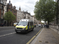 Police car in the Whitehall area of London, U.K., on Thursday, April 27, 2017. A man was arrested on suspicion of the commission, preparatio...