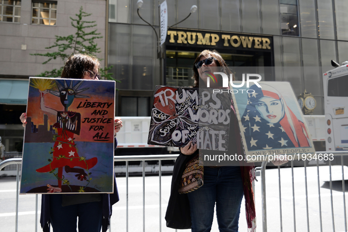 Patrice LaMarina and Barbara Smucker protests outside Trump Tower as NYC prepares for first return of US President Donald Trump to the city...