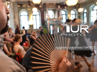 Dancers perfom Argentine tango during an afternoon milonga event in Hevre Pub, an event that was a part of Krakus Aires Tango Festival 2017,...