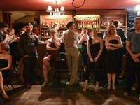 Dancers awaiting for their partners to dance Argentine tango during an afterparty event in Klub Cabaret, an event that was a part of Krakus...