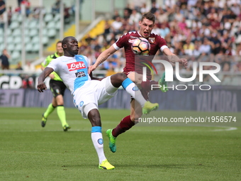 Kalidou Koulibaly (SSC Napoli) and Andrea Belotti (Torino FC) compete for the ball during the Serie A football match between Torino FC and S...