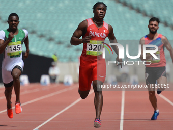 Andrew Fisher (Center) of Bahrain on his way to win Men's 100m Qualification Round - Heat 4, during day five of Baku 2017 - 4th Islamic Soli...
