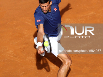 Novak Djokovic of Serbia plays a shot during his 3rd round match against Roberto Bautista of Spain in The Internazionali BNL d'Italia 2017 a...