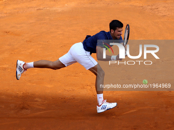 Novak Djokovic of Serbia plays a shot during his 3rd round match against Roberto Bautista of Spain in The Internazionali BNL d'Italia 2017 a...