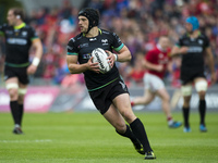 Dan Evans of Ospreys runs with the ball during the Guinness PRO12 Semi-Final match between Munster Rugby and Ospreys at Thomond Park Stadium...