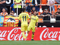 Manu Trigueros of Villarreal CF celebrates after scoring a goal during their La Liga match between Valencia CF and Villarreal CF at the Mest...