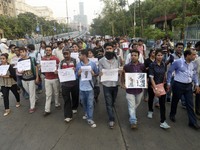 Indian  Journalists  take parts in a protest rally after  assaulted by the Kolkata Police on Monday while covering clashes between police an...