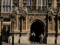 Police and troops guard prominent parts of central London, on May 24, 2017 in the wake of the Manchester bombing on Monday. Police investiga...