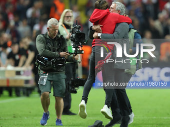 Jose Mourinho, Manager of Manchester United and his son Jose Mario Mourinho JR. celebrate victory following the UEFA Europa League Final bet...