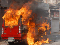 BJP activists  set on fire Kolkata Police Jeep during a protest demonstration against All India Trinamool congress Government near Kolkata P...
