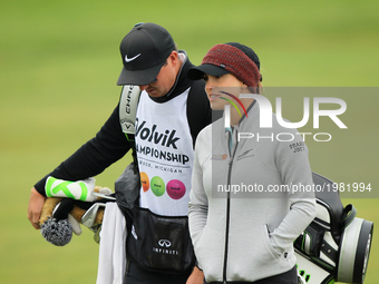 Belen Mozo of Spain and caddie head to the 10th green during the first round of the LPGA Volvik Championship at Travis Pointe Country Club,...