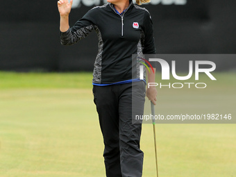 Stacy Lewis of the United States acknowledge the crowd after her birdie shot on the 18th green during the first round of the LPGA Volvik Cha...