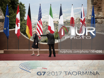 Italy, Taormina:Italian Prime Minister Paolo Gentiloni  shows to the british Prime Minister Teresa may the way to get out of the stage  at t...