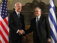 Greek PM Lucas Papademos (R) with US Vice President Joe Biden, at Maximos mansion, in Athens on December 6, 2011  (
