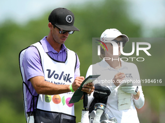 Sarah Jane Smith of Australia and caddie wait on the fairway of the first hole during the second round of the LPGA Volvik Championship at Tr...