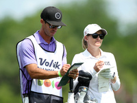 Sarah Jane Smith of Australia and caddie wait on the fairway of the first hole during the second round of the LPGA Volvik Championship at Tr...