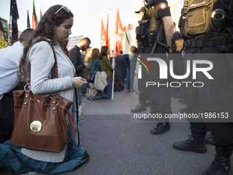 Parying woman during strike near Powszechny theatre in Warsaw on May 27, 2017.   Sit-in strike named 