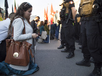 Parying woman during strike near Powszechny theatre in Warsaw on May 27, 2017.   Sit-in strike named 