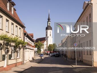 A street in the city center viewing to the Saint Nikolai church is pictured in Luebbenau in the region of the Spreewald, Germany on May 27,...