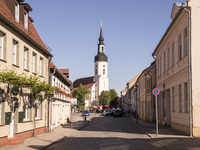 A street in the city center viewing to the Saint Nikolai church is pictured in Luebbenau in the region of the Spreewald, Germany on May 27,...