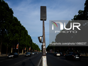 Champs Elysees boulevard in Paris, France on May 28, 2017. Much of French people and tourists enjoyed hot and sunny weather with temperature...