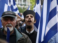 Supporters of the ultra nationalist party Golden Dawn attend a rally in central Athens on Monday May 29, 2017  to commemorate the anniversar...