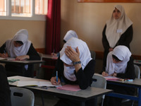  Palestinian High school students writing their final exams at a high school in the gaza city on 03 June 2017 (