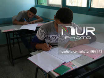  Palestinian High school students writing their final exams at a high school in the gaza city on 03 June 2017 (