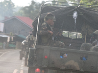A truck loaded with wounded Philippines marines rush to hospital following a heavy fight between Islamic rebels and the Philippine troops in...
