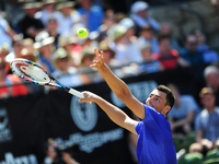 Bernard Tomic (AUS) serves during a match against Tomas Berdych (CZE) in the round of eight of the Mercedes Cup in Stuttgart, Germany on Jun...