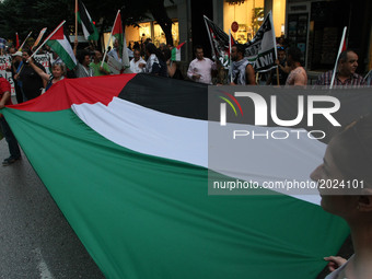 A group of pro-Palestinian people stage an  anti-Israel protest during Israeli's Prime Minister Benjamin Netanyahu visit in Thessaloniki, Gr...