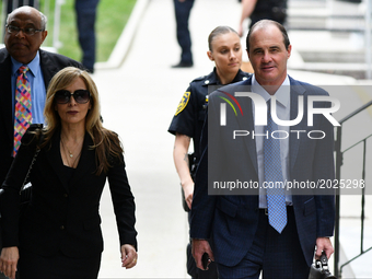 Ahead of entertainer Bill Cosby, his legal team with defense attorneys Angela Agrusa and Brian McMonagle arrive at Montgomery Courthouse for...