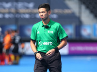 Umpire Hong Zhen Lim (Singapore)
 during The Men's Hockey World League Semi-Final 2017 Group A match between England  and Malaysia The Lee V...