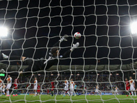 Spain's goalkeeper Kepa Arrizabalaga Revuelta dives for the ball during the UEFA U-21 European Championship Group B football match Portugal...