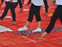 Participants perform a Yoga session to mark International Yoga Day in Dimapur, India north eastern state of Nagaland on Wednesday, 21 June 2...